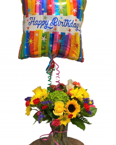Send cheer and best wishes with the Bright & Beautiful Birthday Arrangement. Bold colors, the freshest blooms and a joyful balloon combine to create a festive feel for their special day. Handpicked happiness delivered.